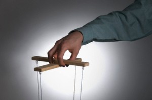 Male operating puppet controls